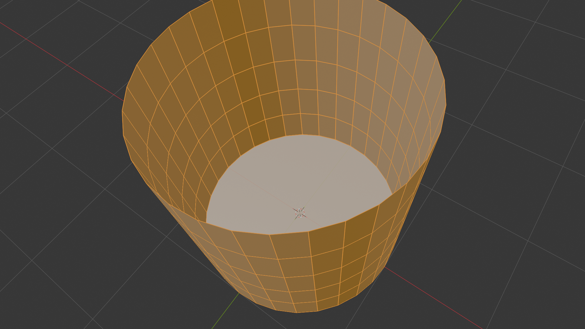 Cylinder with the top face deleted, viewed top-down at an angle so the hollow opening is visible. The bottom face is still intact, visible at the base of the cavity. Loop cuts remain on the side walls.