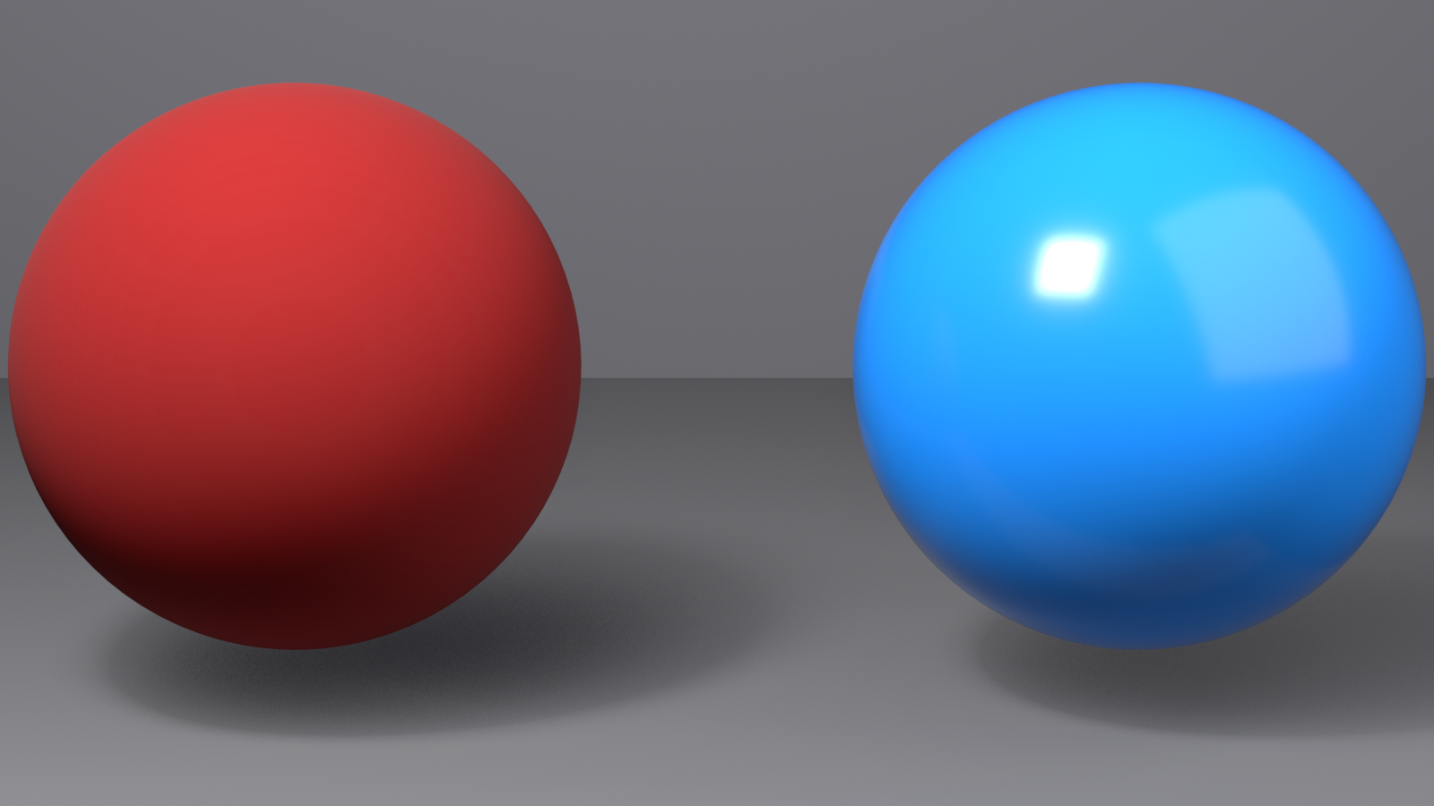 Two non-metallic spheres side by side: a deep red matte sphere on the left with soft diffuse shading, and a bright blue glossy sphere on the right showing a tight specular highlight.