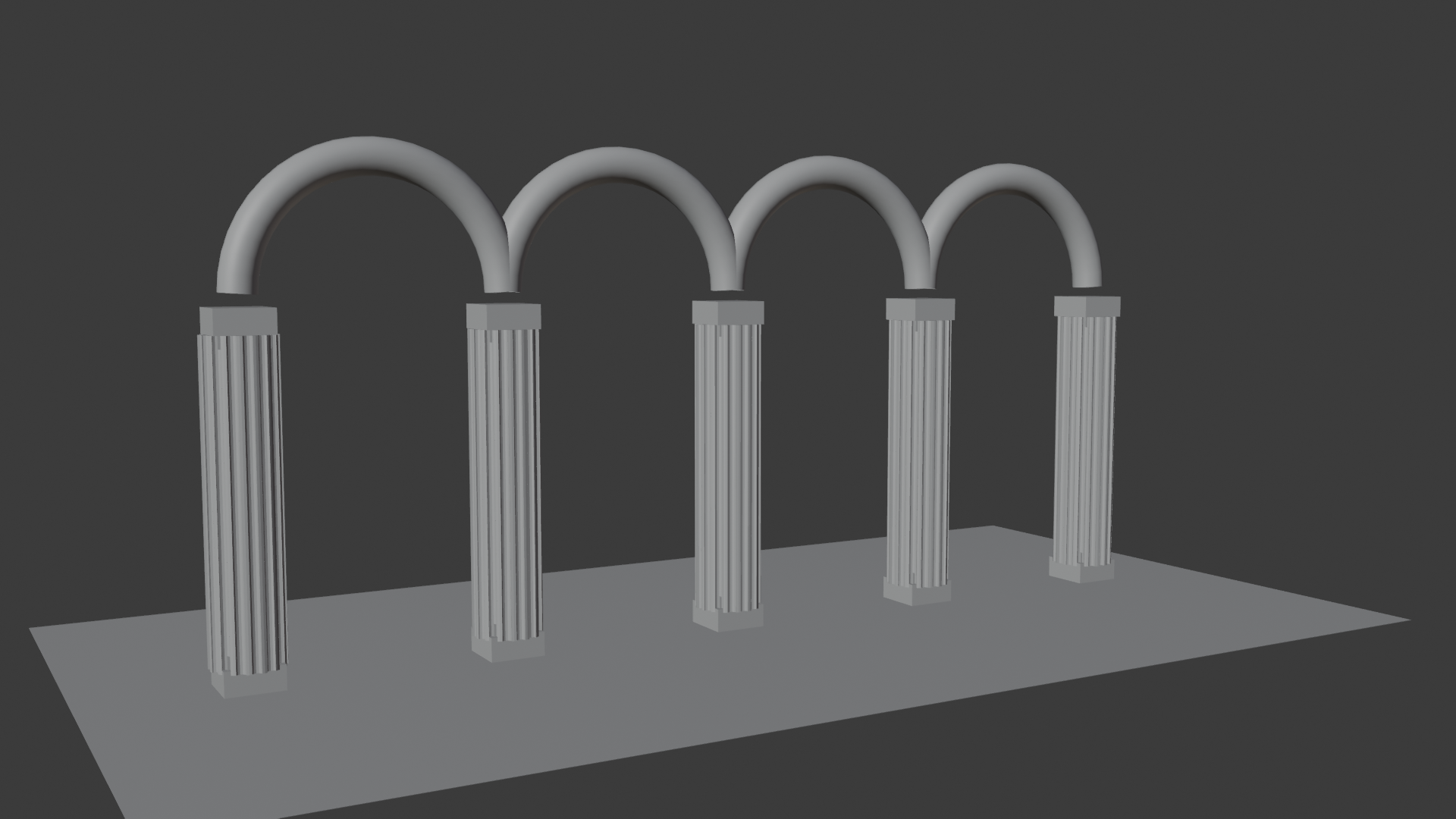 The completed colonnade, five fluted columns linked by four beveled arches, with Boolean fluting grooves running down each shaft.